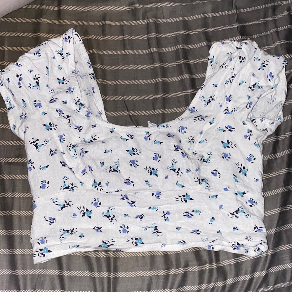 This crop top is from tillys and it has only been worn once it got too small.